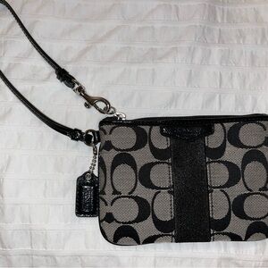 Selling a brand new, never used coach wristlet